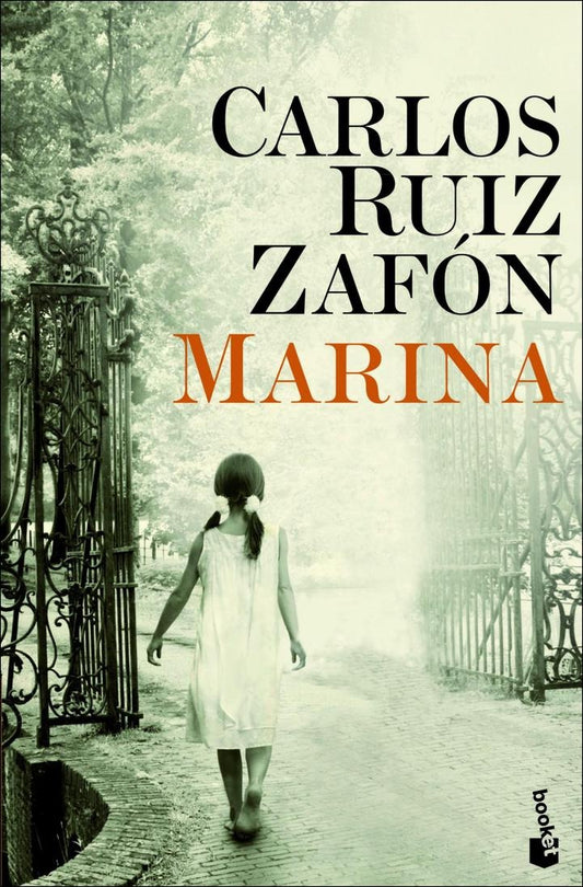 Book cover of 'Marina' by Carlos Ruiz Zafón with a woman walking through a gate.