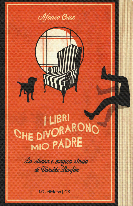 Book cover with an orange background, black and white striped chair, dog, and silhouette of a person, featuring text in Italian.