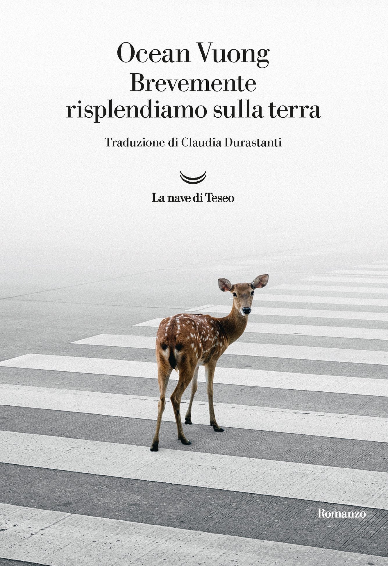 Book cover with a deer on a zebra crossing, featuring text about Ocean Vuong's work.